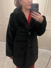 Black faux fur coat